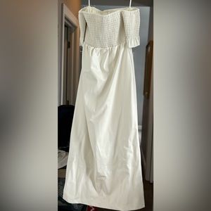 Smocked top and sleeves.Fabric is leatherette.So soft and gorgeous!